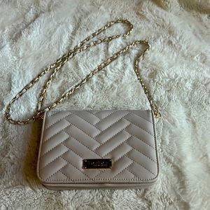 bebe clutch with removable strap. Light pink. Excellent condition.